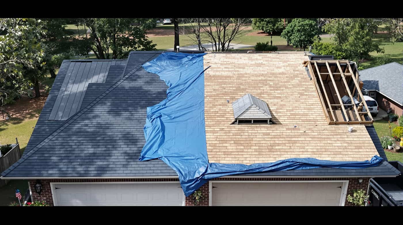 Residential roof replacement completed by Southern Roofing Systems on a home in Foley, Baldwin County, Alabama showing new architectural shingles installed with six-nail pattern and sealed roof deck built for Gulf Coast conditions including 140 to 160 mph design wind speeds and 66 inches of annual rainfall across the southern Alabama climate