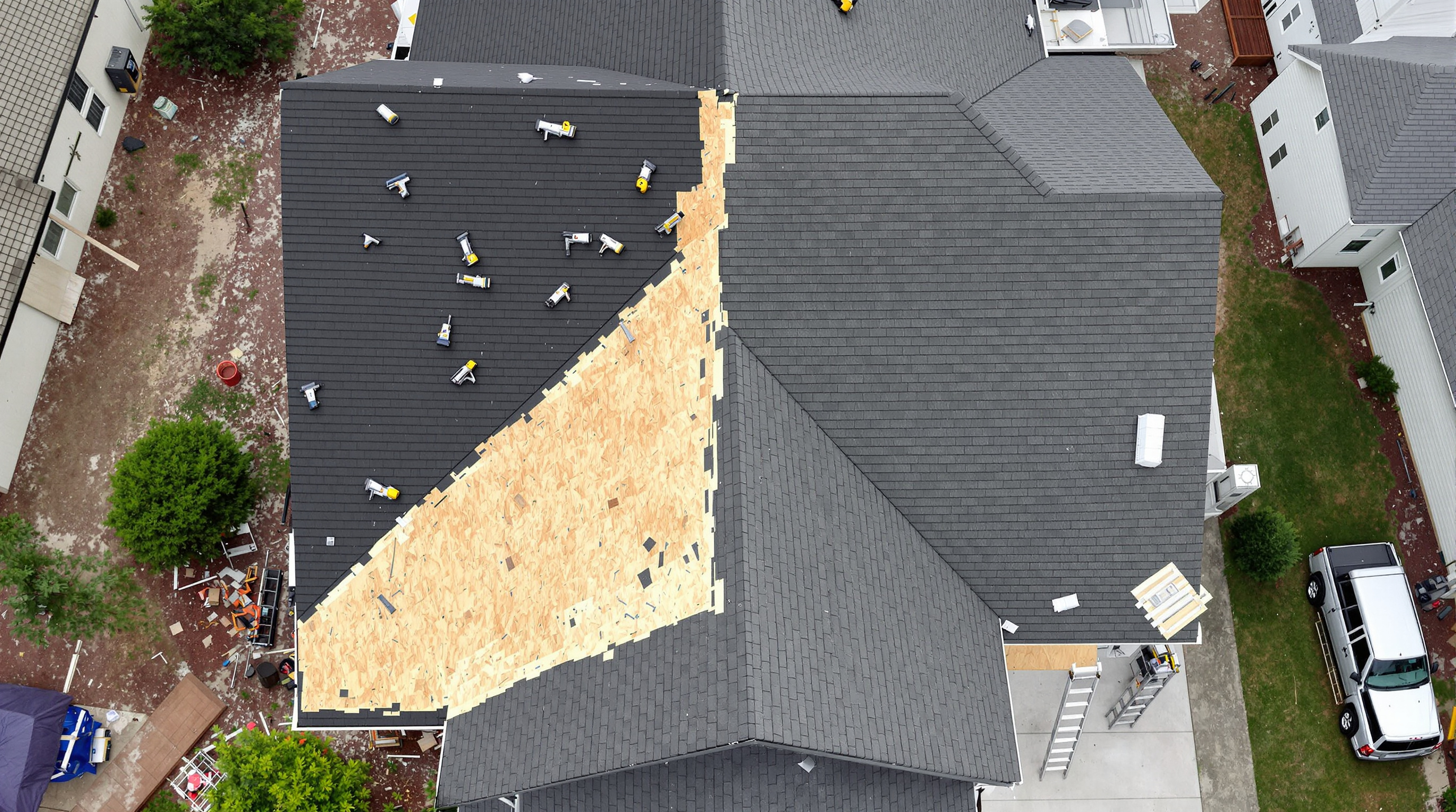 Southern Roofing Systems crew installing a new roof on a Gulf Coast home